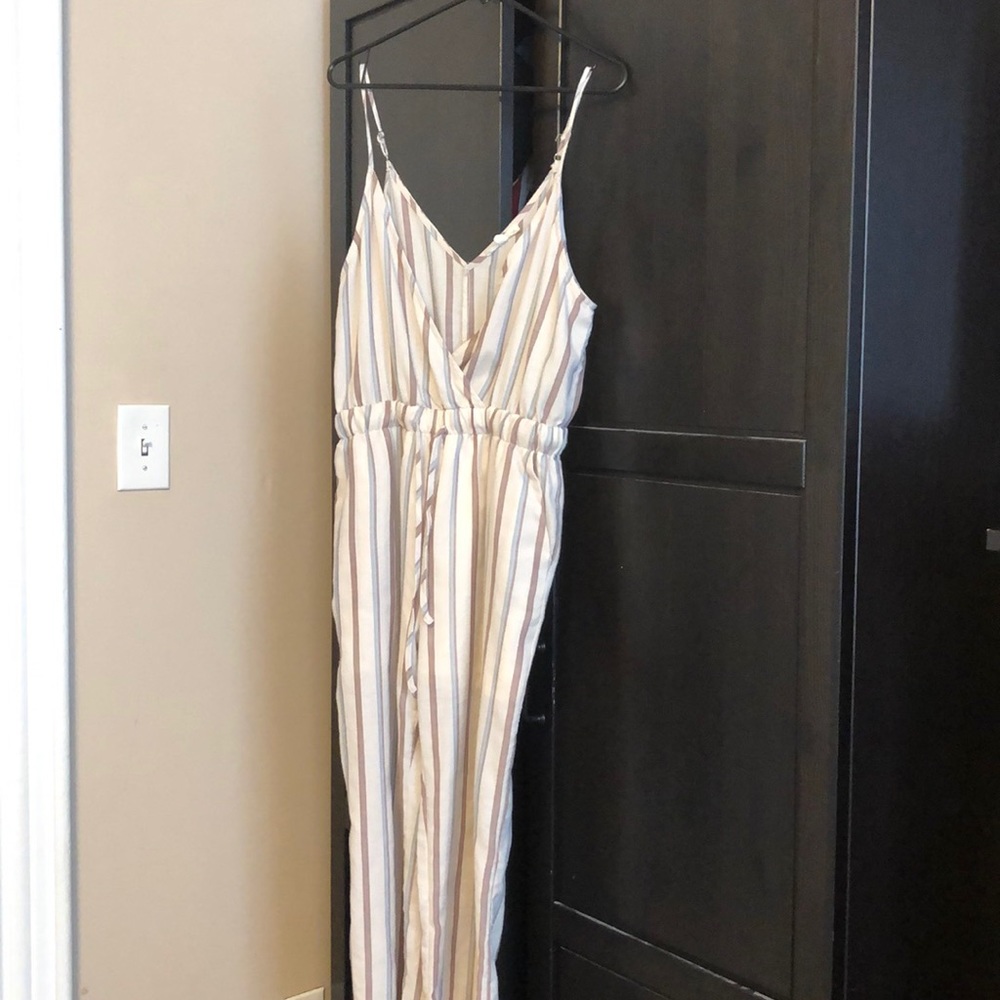 Tan jumpsuit with stripes